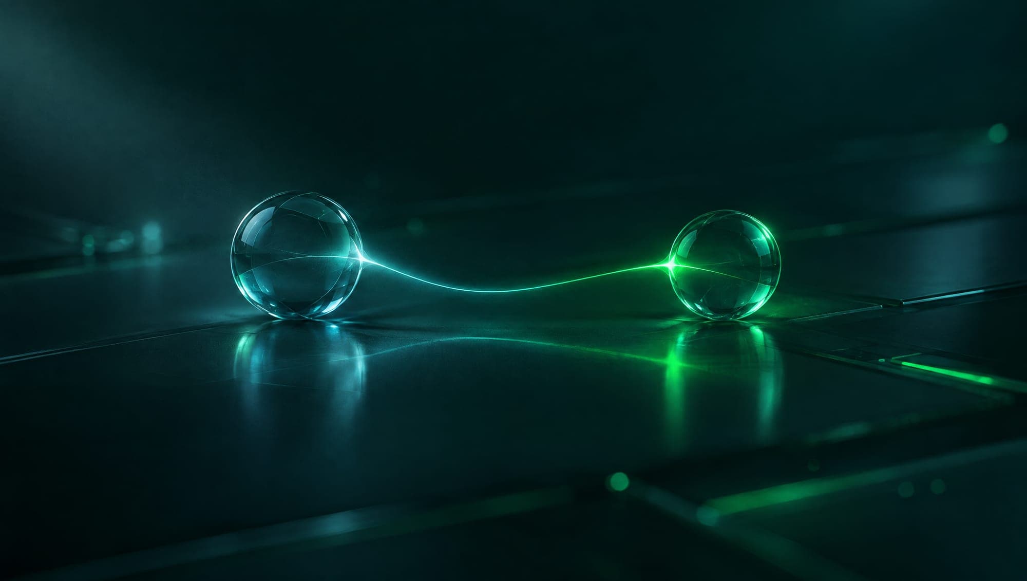 Two glass spheres joined by a single thread of light that turns from teal to green