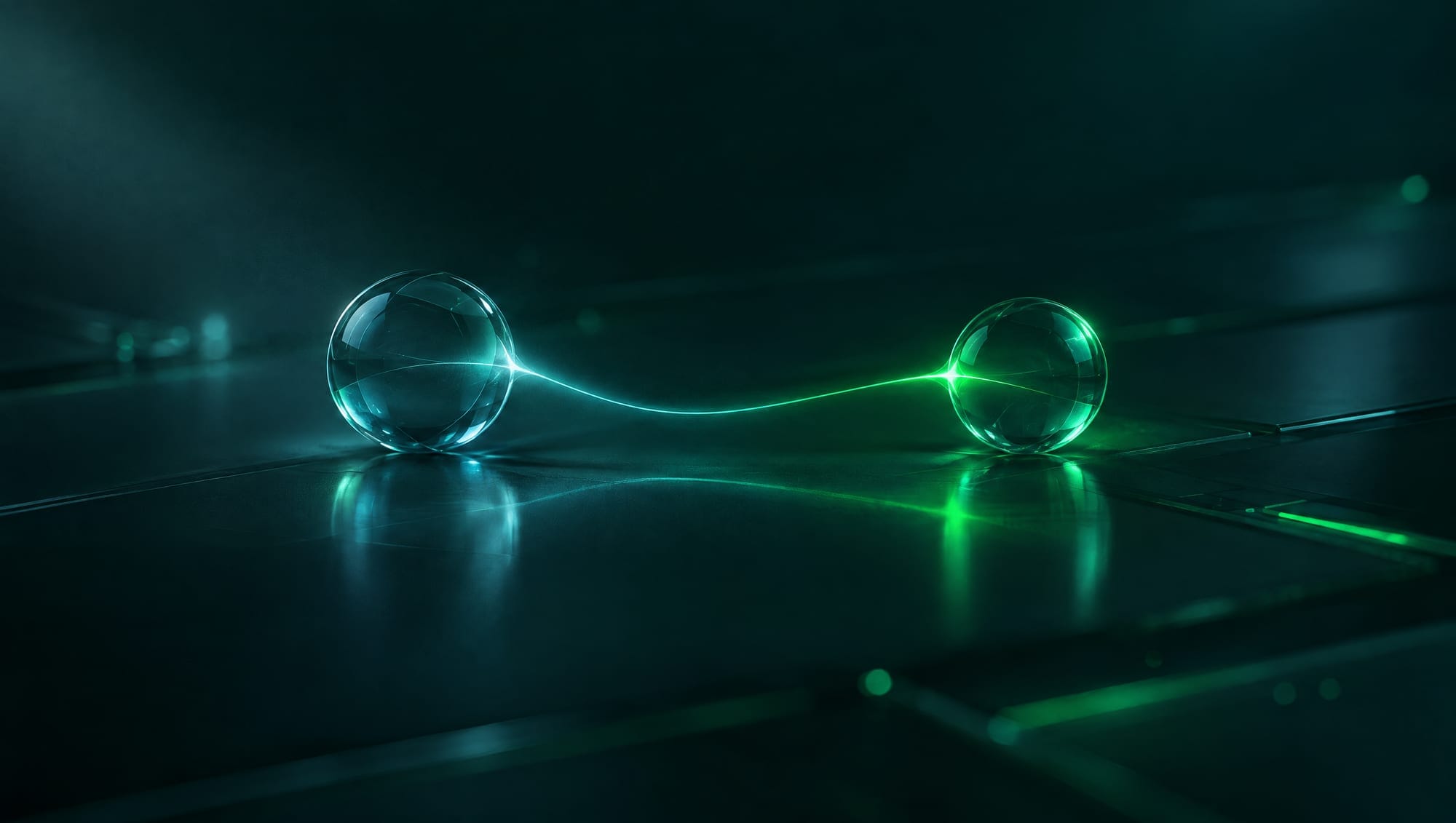 Two glass spheres joined by a single thread of light that turns from teal to green