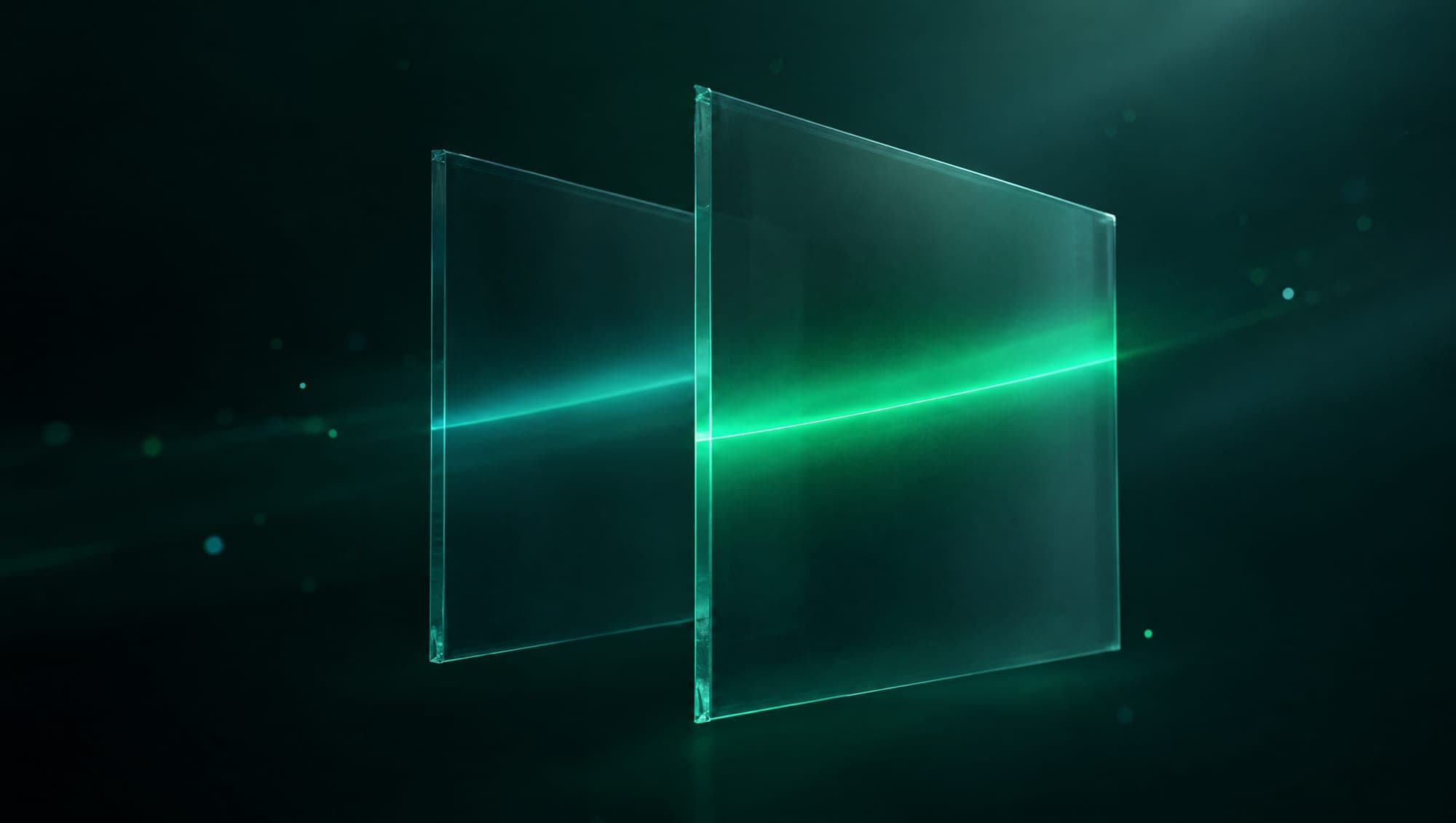 Two glass panels, one band of light fading as a brighter green band takes its place
